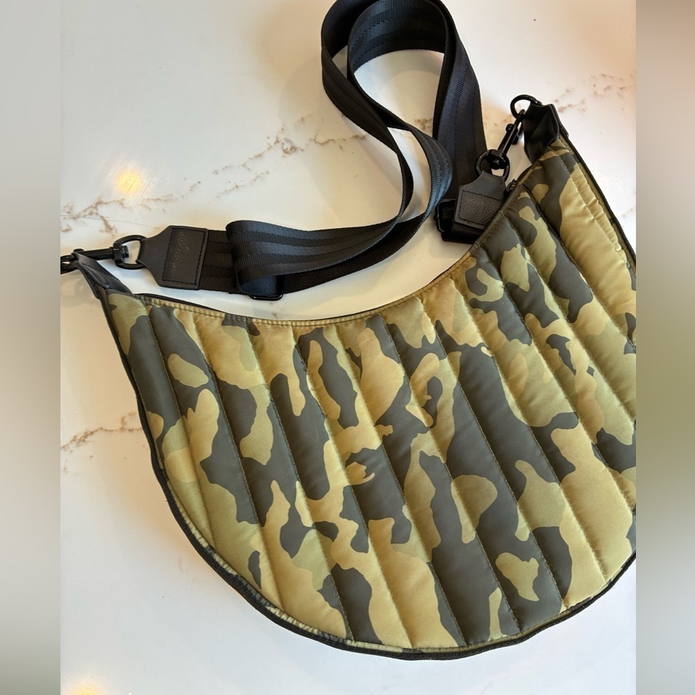 Think ROLYN camo green puffer crossbody bag with orange stripe